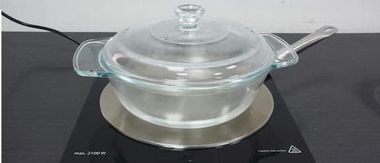 place induction converter disk between your cookware and the stovetop